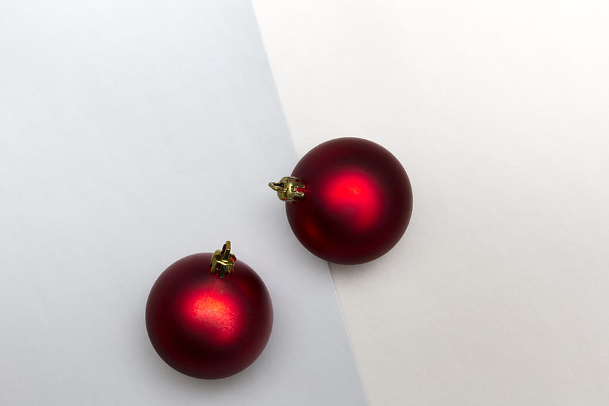 Minimalist Red Christmas Baubles on White Background