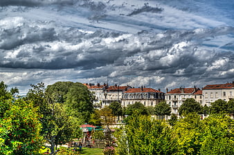 Dramatic Cloudy Sky Over Valence France Cityscape