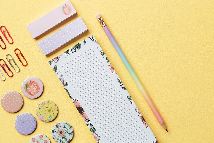 Pastel Stationery Flat Lay with Yellow Background
