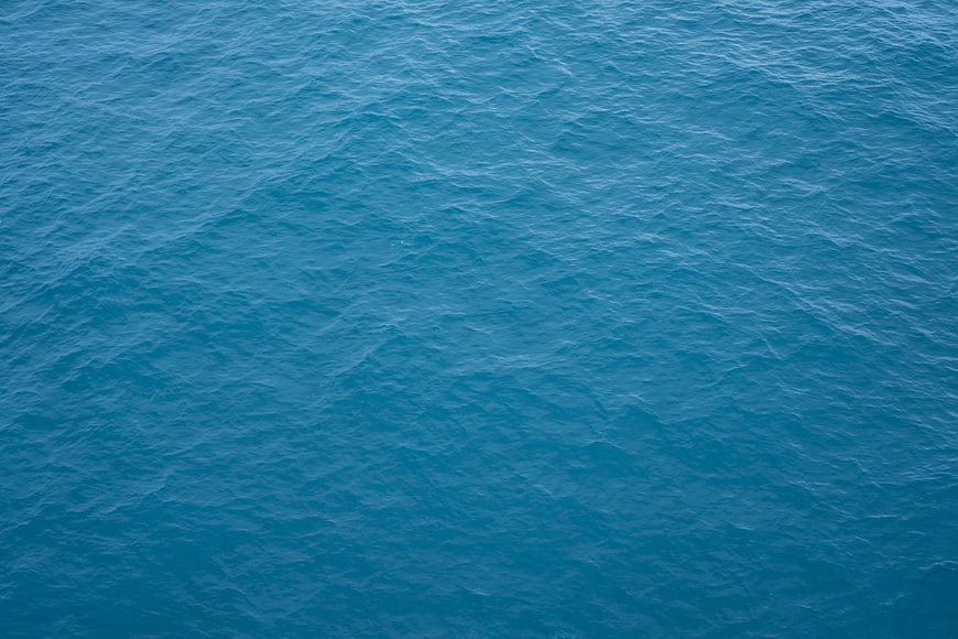 Aerial View of Deep Blue Ocean Water Surface Texture