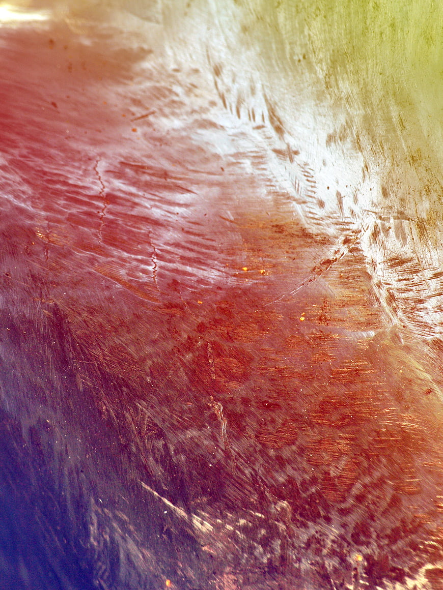 Abstract colorful scratched texture background with grunge effect