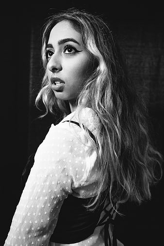 Dramatic Black and White Portrait of Woman Looking Back