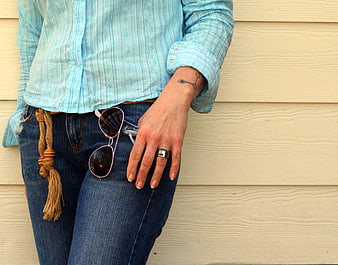 Casual fashion woman wearing jeans and sunglasses