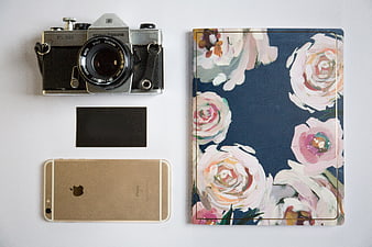 Vintage Camera, Smartphone, and Floral Journal Flat Lay