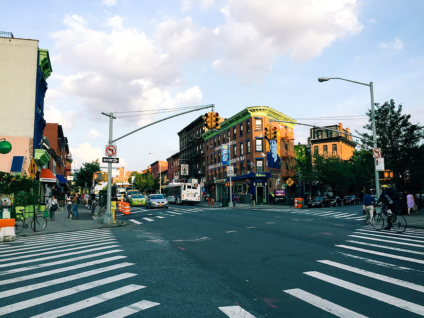 Urban Street Intersection with Crosswalk and City Buildings