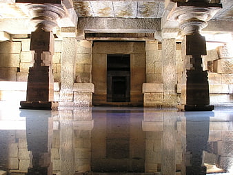 Ancient Stone Temple Interior with Reflective Floor