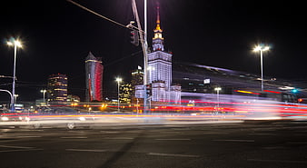 Warsaw skyline at night with long exposure traffic light trails