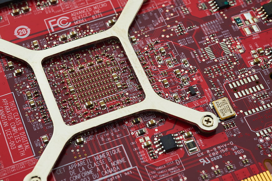Close-up of red computer graphics card circuit board