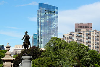 Boston skyline with equestrian statue and modern skyscrapers