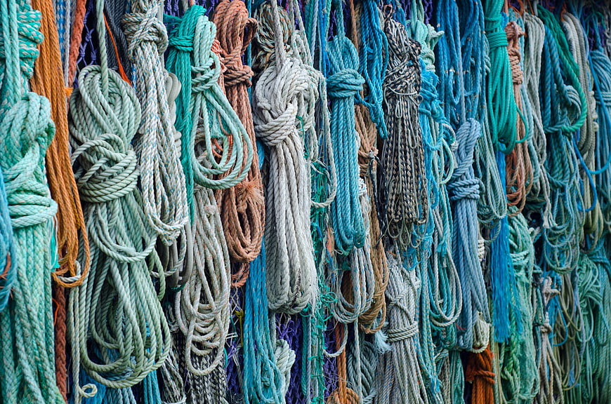 Colorful Hanging Fishing Ropes and Nautical Cordage