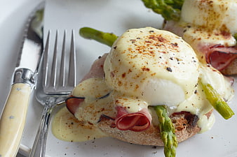 Close-up of Eggs Benedict with Asparagus and Hollandaise Sauce