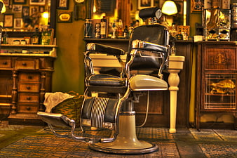 Vintage barber chair in retro barbershop interior