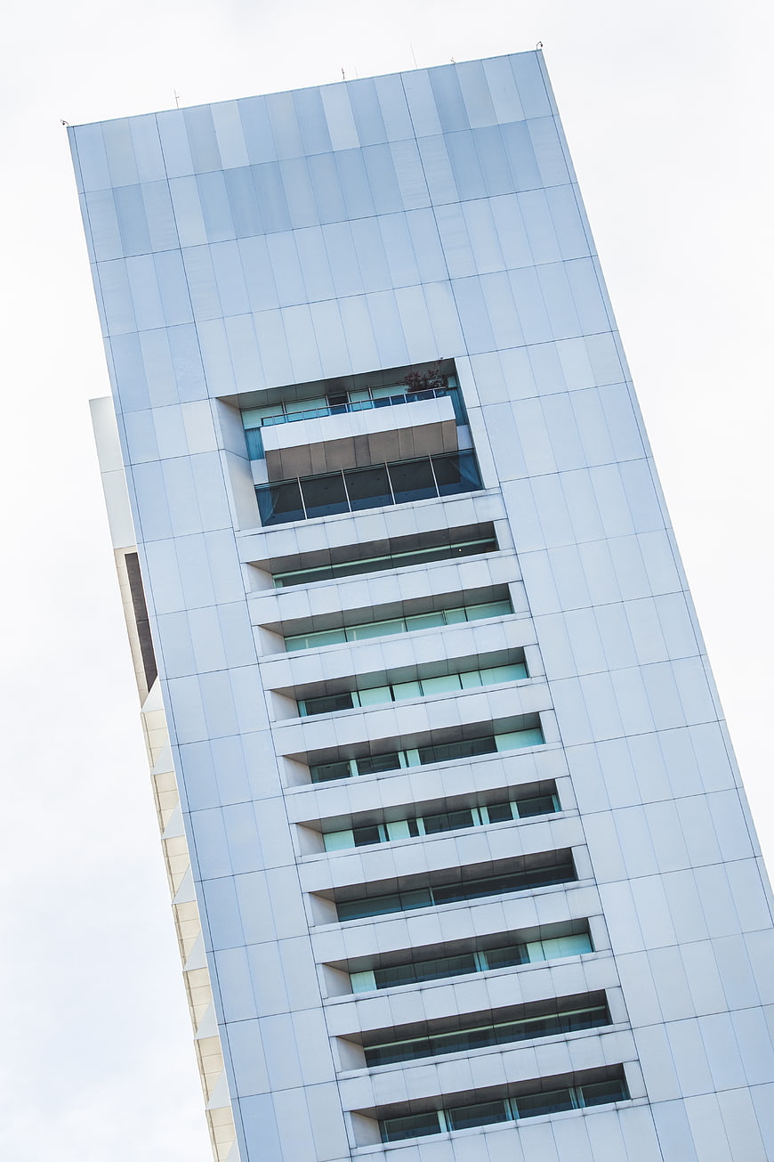 Low angle view of modern glass skyscraper architecture