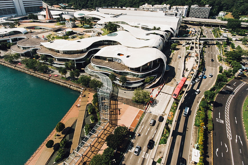 Aerial view of modern curved architecture by the sea