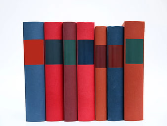 Colorful vintage book spines on white background