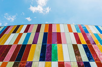 Colorful Modern Building Facade with Blue Sky