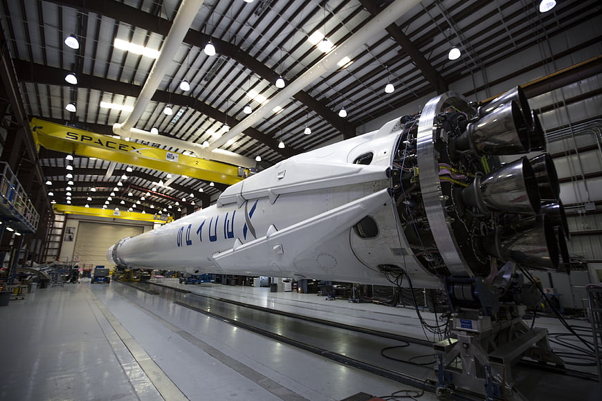 SpaceX Starship rocket assembly in industrial hangar