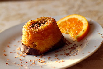 Chocolate Orange Cake with Fresh Orange Slice on White Plate