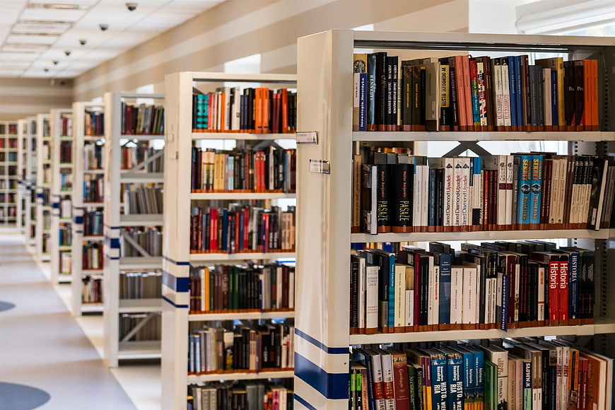 Rows of bookshelves in a modern library interior